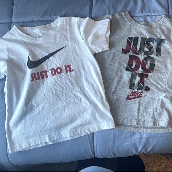 Toddler Nike shirts. Size 7 but I think they run a size smaller more like a 6. - Picture 1 of 3